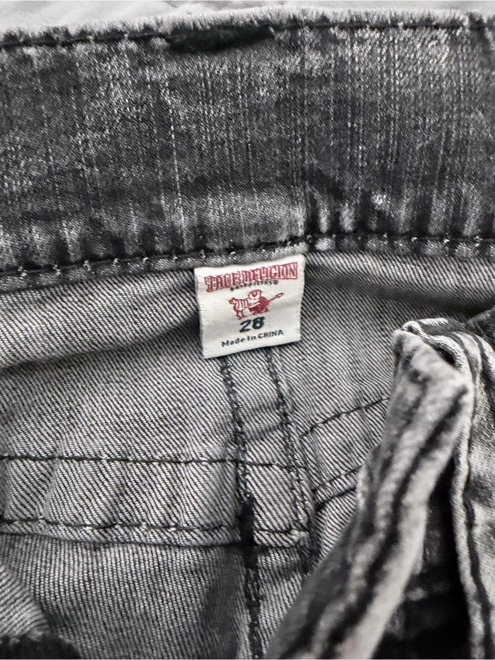 True Religion men’s Black and White Acid Wash Skinny Jeans
